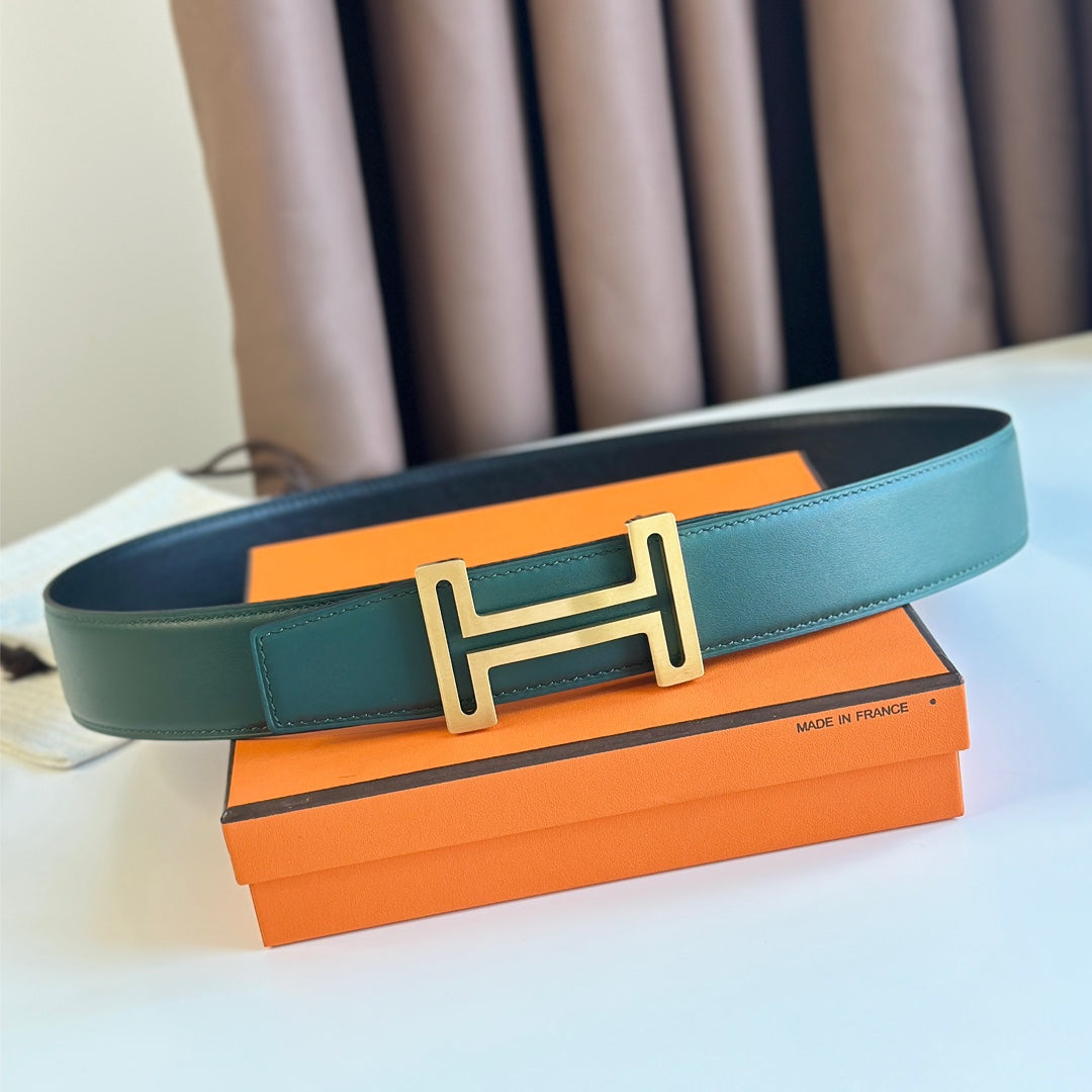 HM BELT BUCKLE & REVERSIBLE TEAL GREEN AND BLACK LEATHER STRAP 38MM GOLD HARDWARE