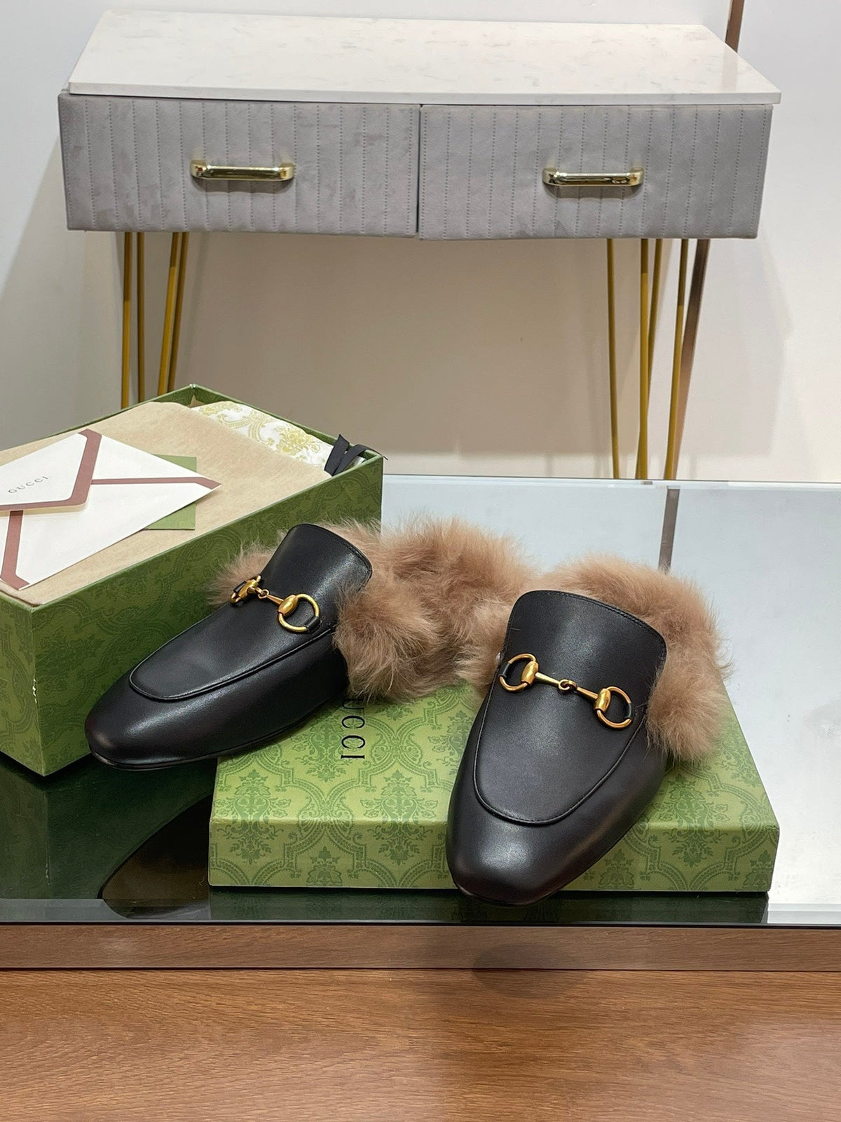 HORSEBIT MULE IN BLACK CALFSKIN AND LAMB WOOL LINING