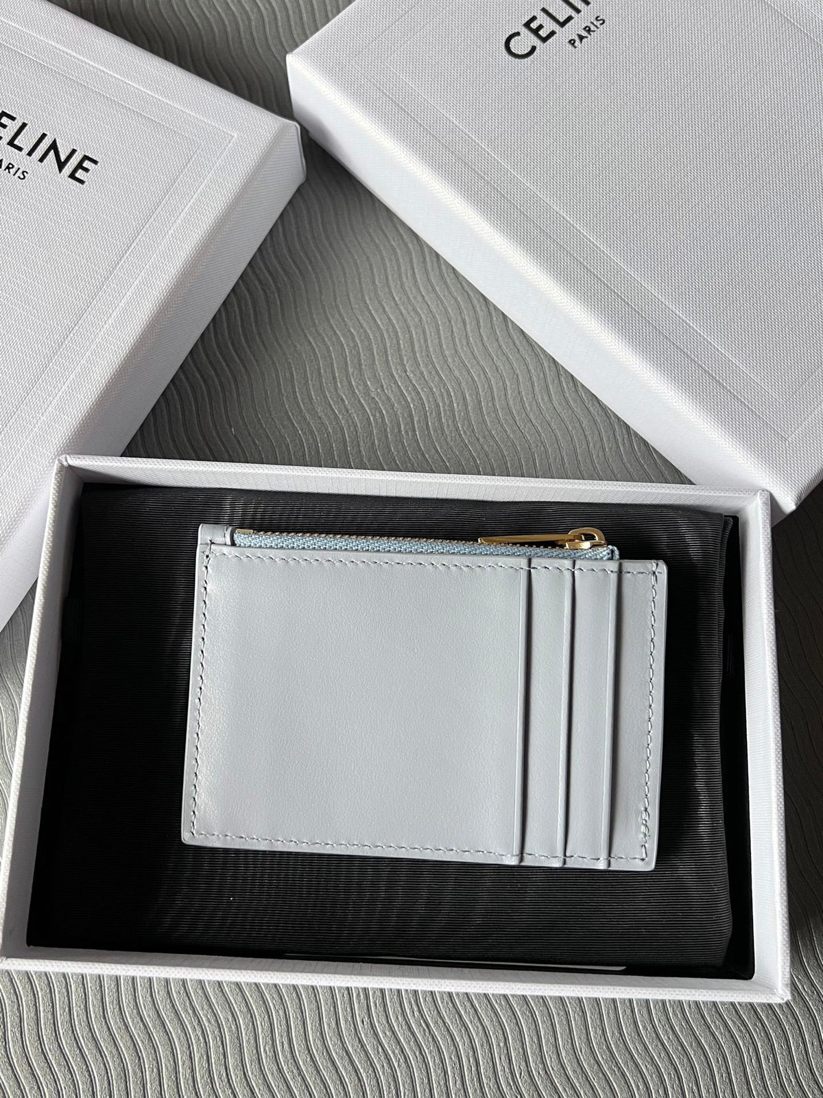 TRIOMPHE Zipped Card Holder Glacier Cowhide Leather