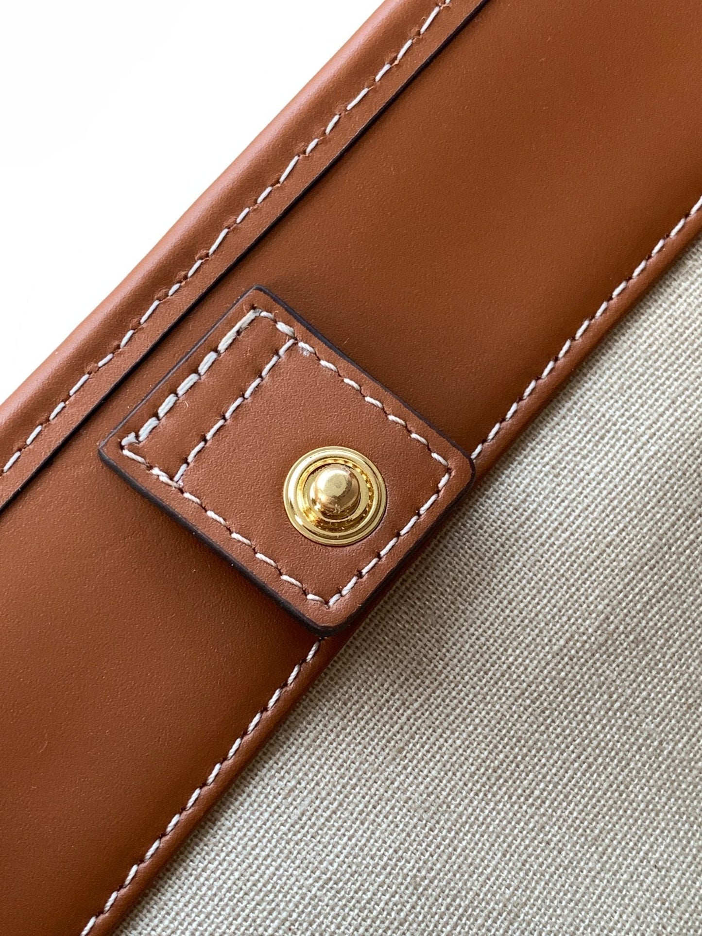 SMALL BUCKET CUIR TRIOMPHE 22CM IN STRIPED TEXTILE AND TAN CALFSKIN
