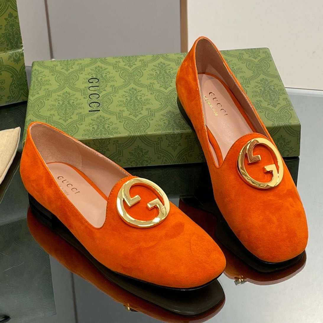 BLONDIE LOGO-PLAQUE LOAFERS IN TIGER ORANGE SUEDE