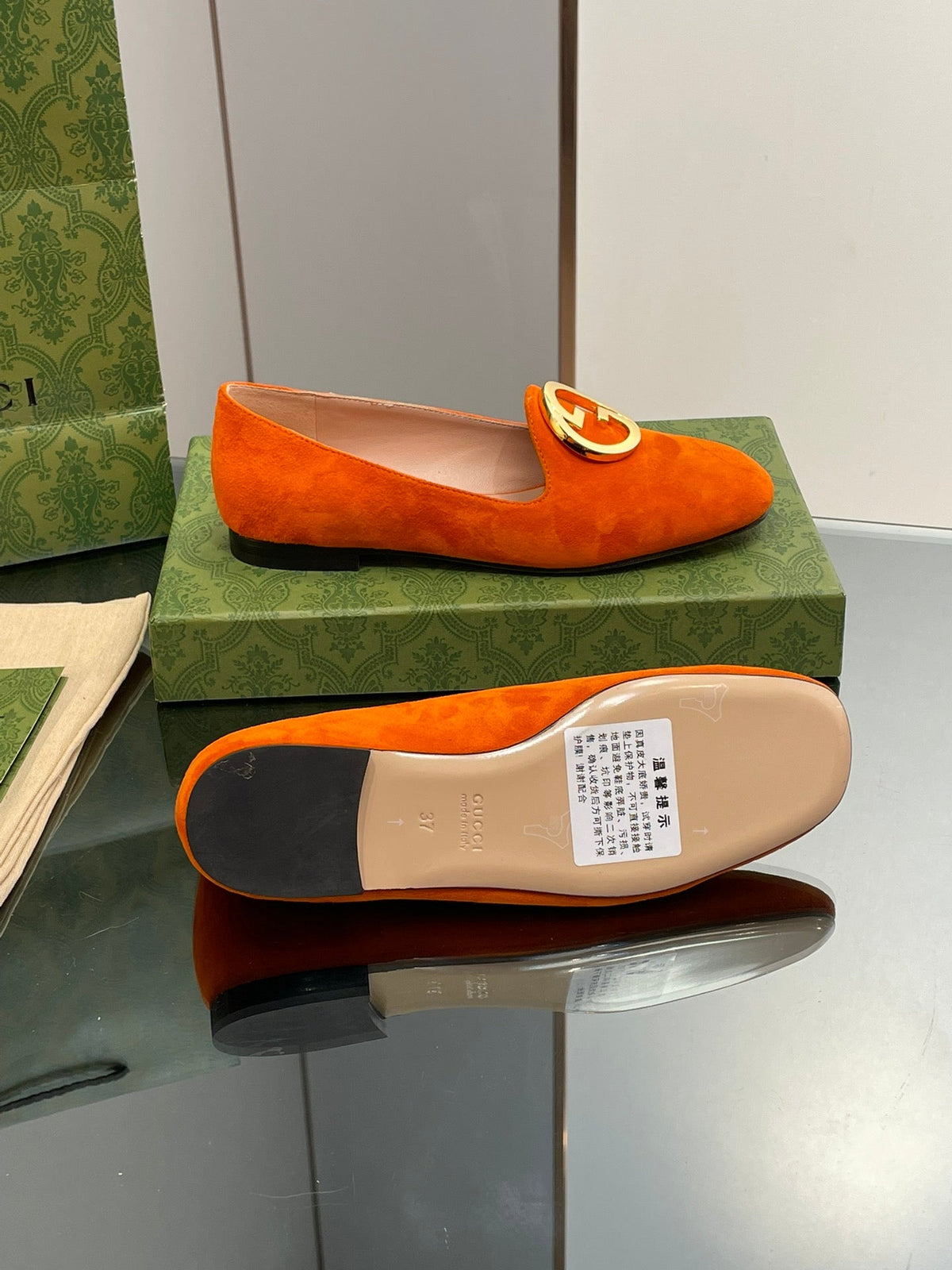 BLONDIE LOGO-PLAQUE LOAFERS IN TIGER ORANGE SUEDE