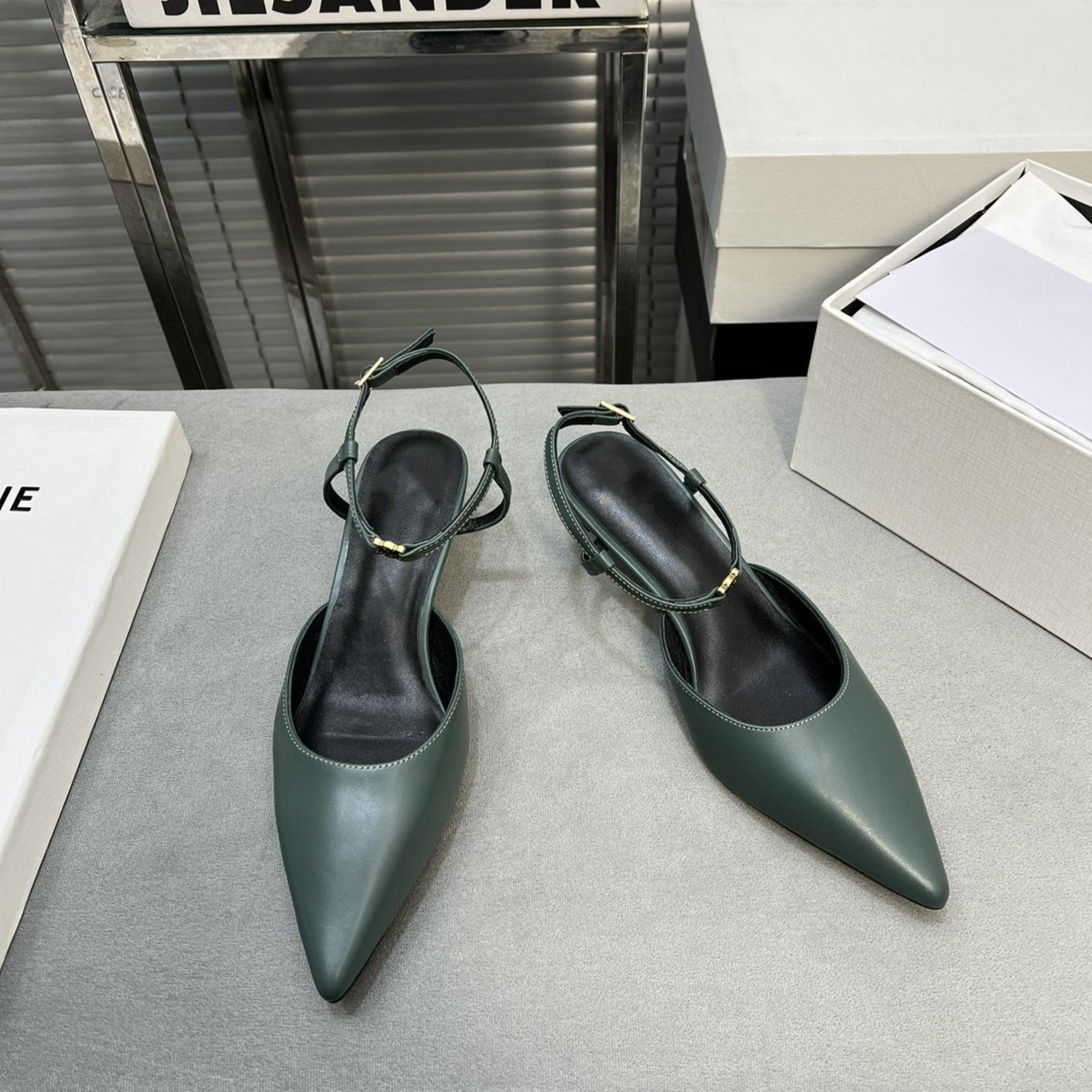 cl kitten 50 blue green calfskin